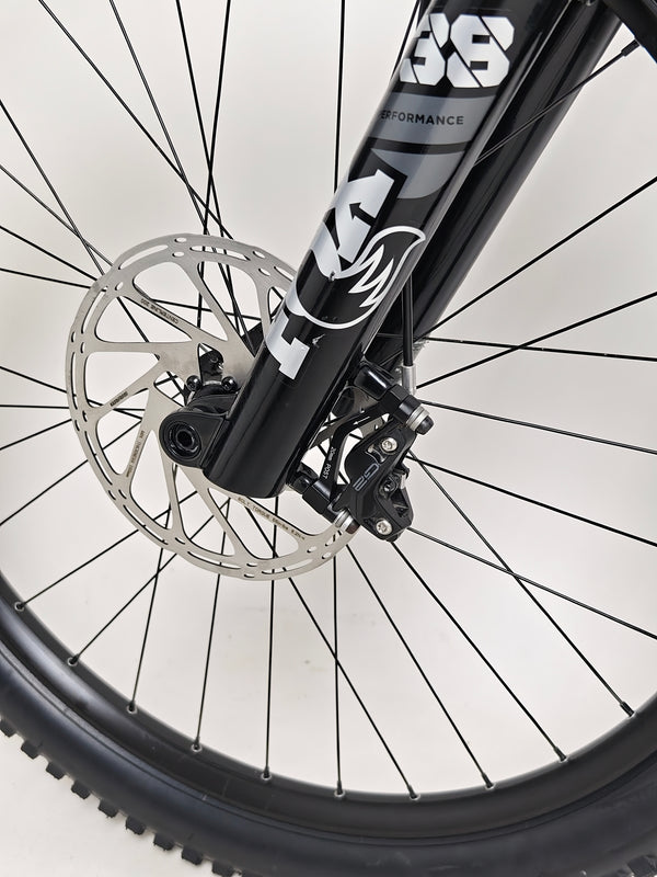 Close-up of the rear wheel setup on the Evil Insurgent LS 27.5 Carbon bike.