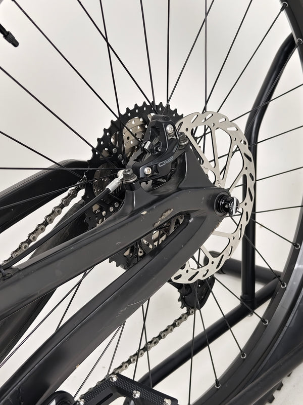 Close-up of the SRAM brakes on the Evil Insurgent LS 27.5 Carbon bike, showcasing performance reliability.