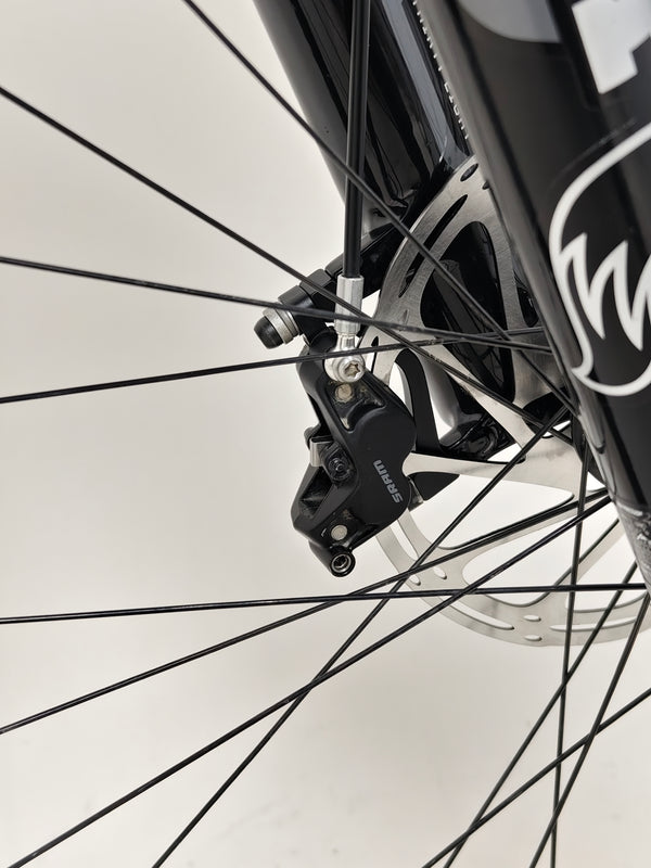 Front angle of the Evil Insurgent LS 27.5 Carbon bike emphasizing its aggressive mountain bike stance.