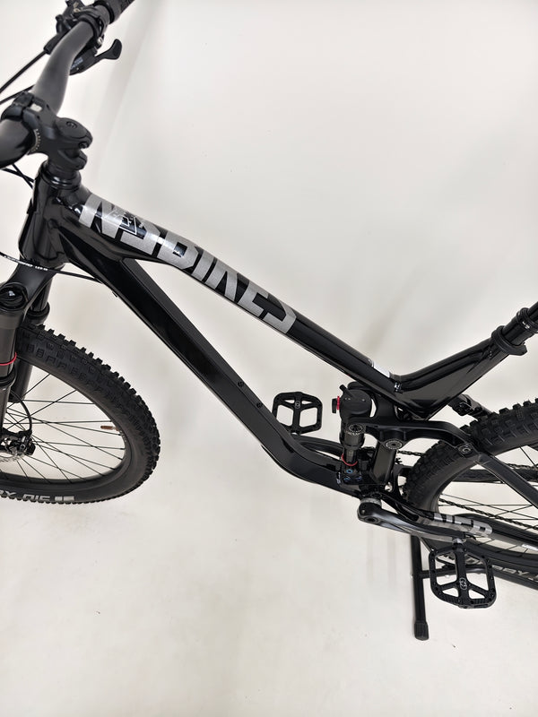 NS Bikes Define AL 130 2 2023 - Underside view highlighting the pedal system and drivetrain from NS Bikes.