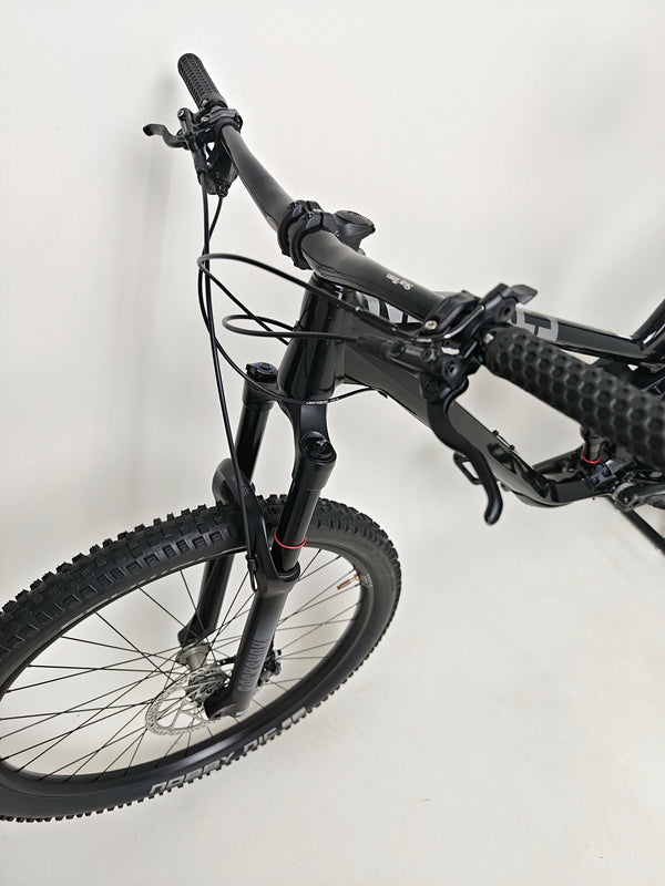 NS Bikes Define AL 130 2 2023 - Profile view showcasing the pedals and drivetrain components from NS Bikes.