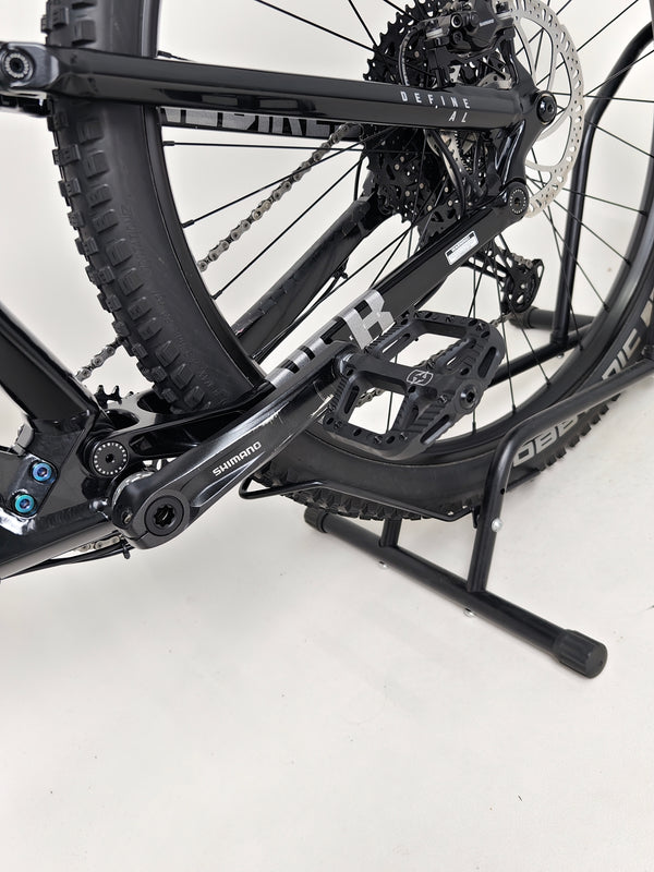 NS Bikes Define AL 130 2 2023 - Close-up of the rear wheel and suspension setup showcasing bike's performance from NS Bikes.