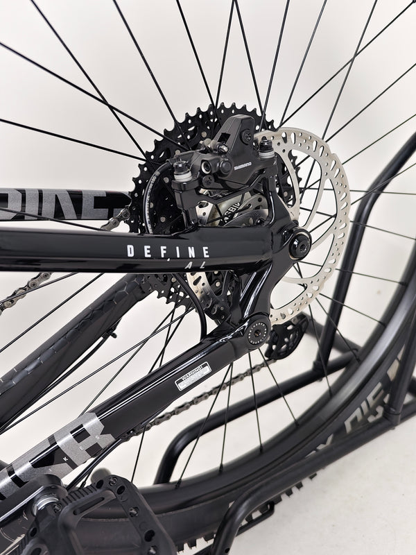 NS Bikes Define AL 130 2 2023 - Close-up of the grip and bar area highlighting comfort and performance features from NS Bikes.