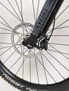 NS Bikes Define AL 130 2 2023 - Close-up of the saddle and suspension showcasing rider comfort from NS Bikes.