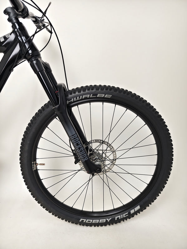 NS Bikes Define AL 130 2 2023 - View depicting the rear wheel and brake setup highlighting effective stopping power from NS Bikes.