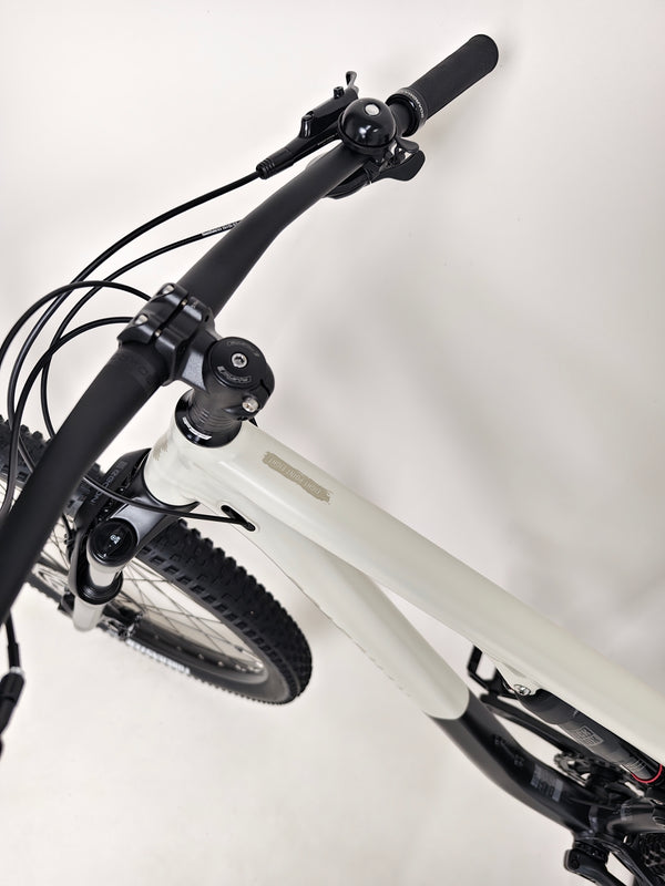 Detailed image of the Shimano CUES RD-U6000 rear derailleur on the 2025 Boardman MTR 8.8 UPGRADED bike.