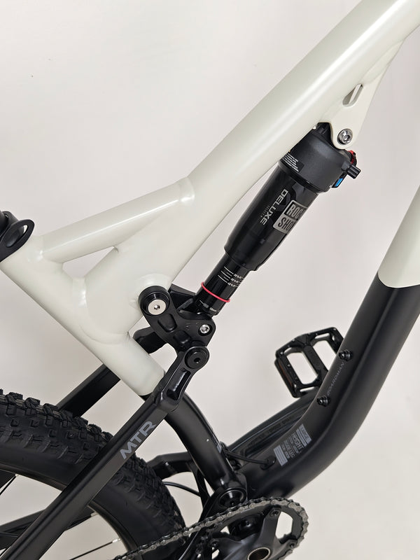 Image showing the bike in action with trails in the background, 2025 Boardman MTR 8.8 UPGRADED.