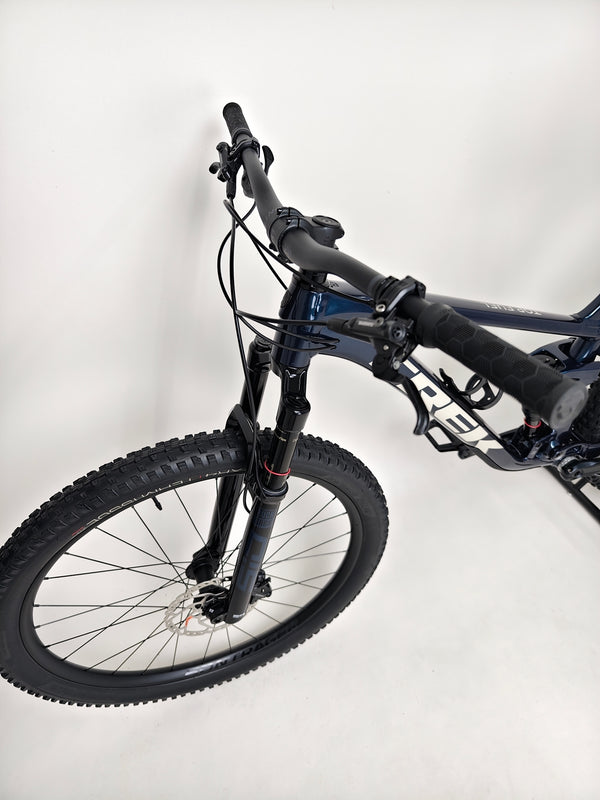 Trek Top Fuel 8 2024 Large Frame Full Suspension Bike at eMado - Side profile view accentuating the bike's ergonomic design.