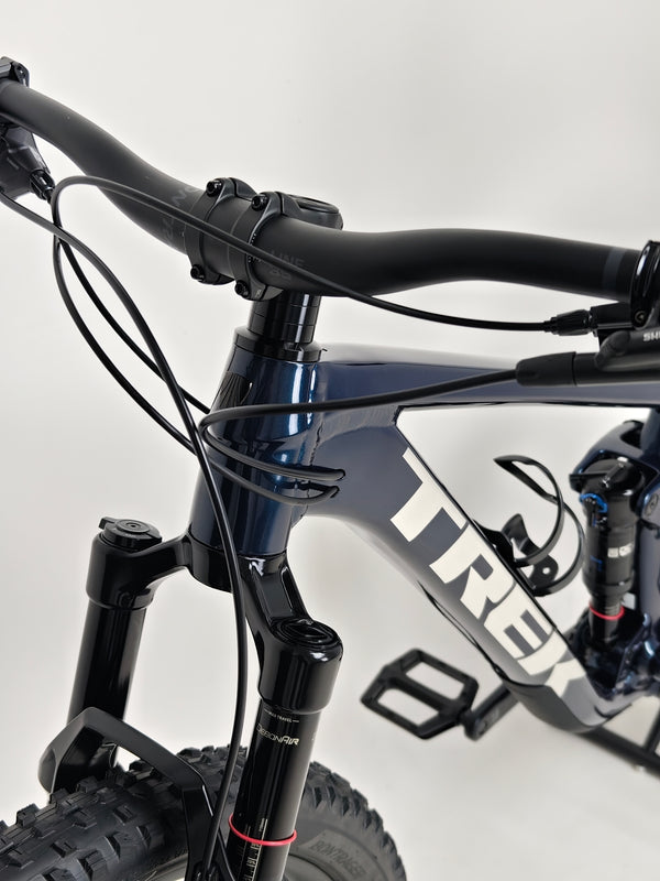 Trek Top Fuel 8 2024 Large Frame Full Suspension Bike at eMado - Profile photo with focus on the engine mount and casters.