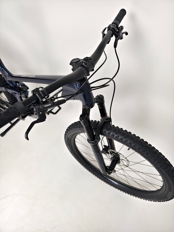 Trek Top Fuel 8 2024 Large Frame Full Suspension Bike at eMado - Image focusing on the bike's clean lines and craftsmanship.