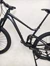 Focus on suspension detailing and shock absorber on Giant Stance 29 2 2024/LARGE mountain bike.