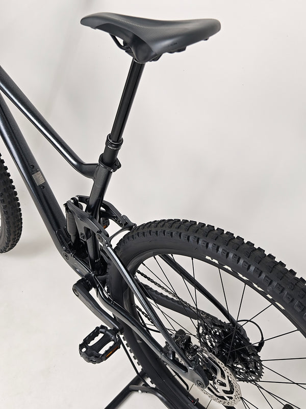 Close detailed view of the brake rotor and caliper on Giant Stance 29 2 2024/LARGE mountain bike.