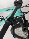 Close-up of the shock and frame interface on the GT Sensor Carbon Pro LE 2024 mountain bike.