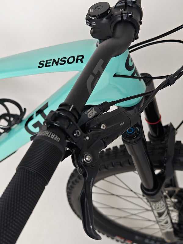 Close-up of the shock and frame interface on the GT Sensor Carbon Pro LE 2024 mountain bike.
