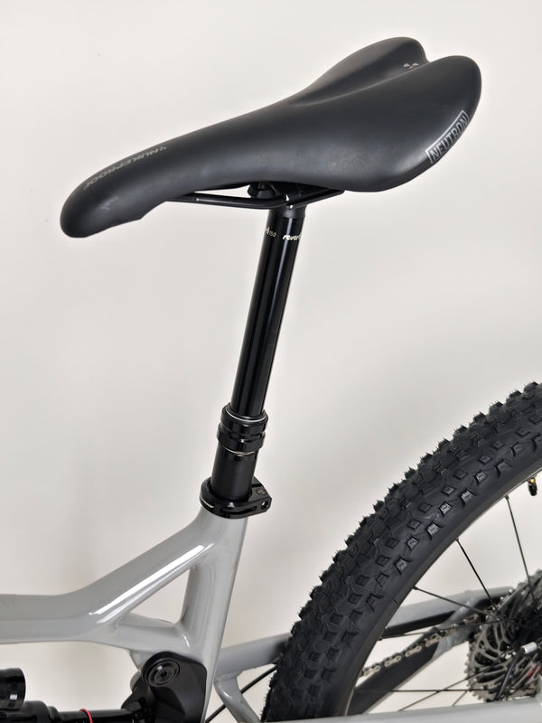 Overhead view of the Nukeproof Mega 275 RS X01 Eagle bike's frame and handlebars, emphasizing its ergonomic setup.