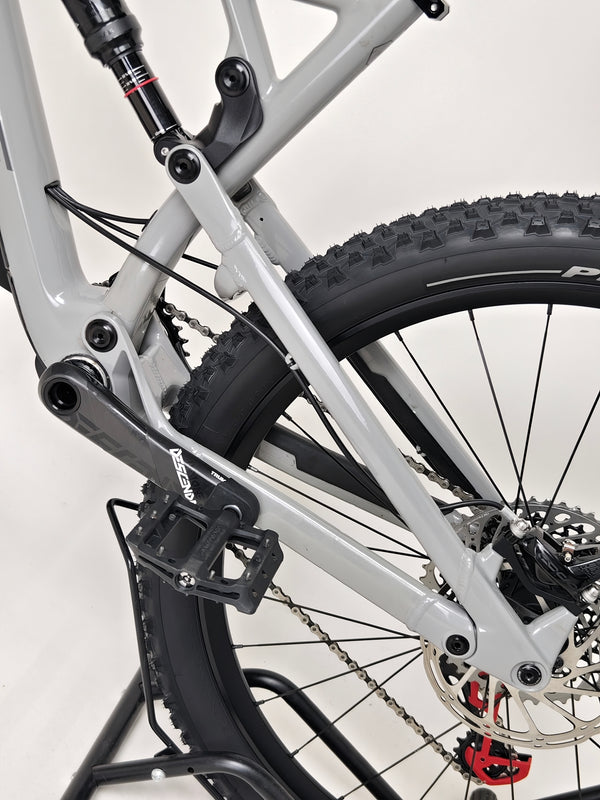 Side view of the Nukeproof Mega 275 RS X01 Eagle bike showcasing the integrated cable routing.