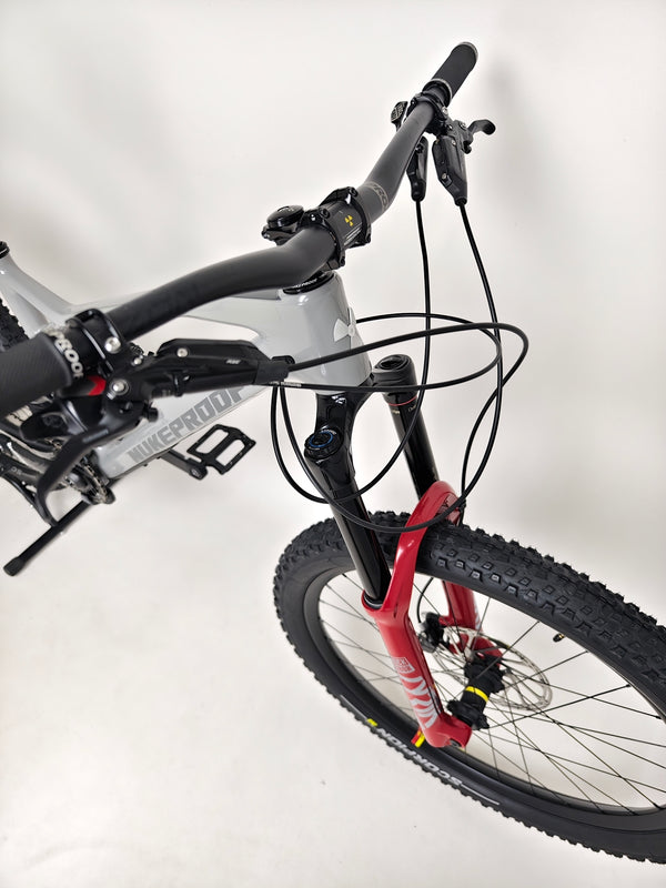 Nukeproof Mega 275 RS X01 Eagle bike showing dynamic angle of the rear suspension system for enhanced support.