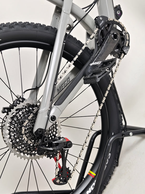 Under angle view of the Nukeproof Mega 275 RS X01 Eagle bike highlighting the frame's material and build quality.