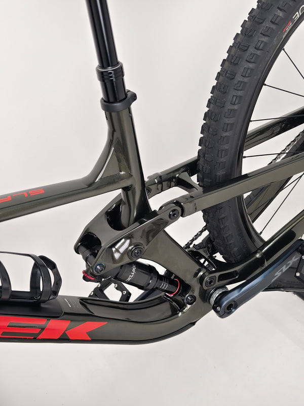 Detailed close-up of Trek Slash 7 2022 suspension components in Excellent Condition - Large Frame.