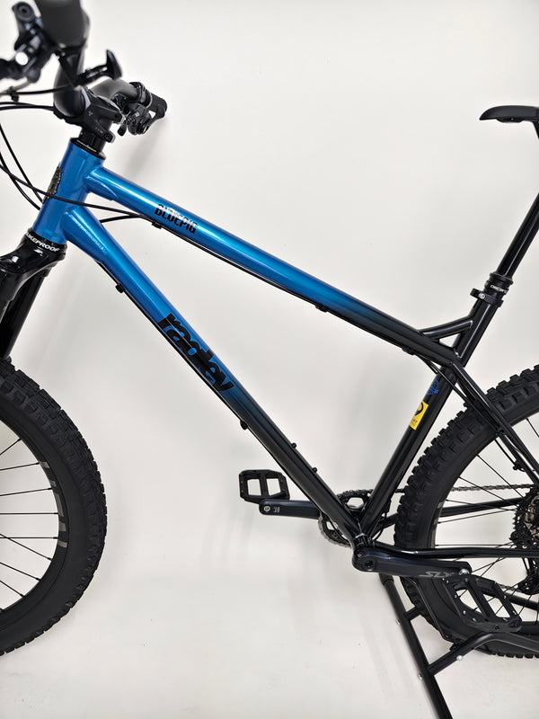 Side angle of the Used Ragley Blue Pig Race 2022 revealing its chainset and drivetrain. Purchase this bike at eMado Bikes.