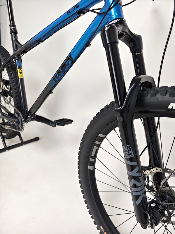 Zoomed-in image of the Shimano SLX brakes on the Used Ragley Blue Pig Race 2022 mountain bike, available at eMado Bikes.