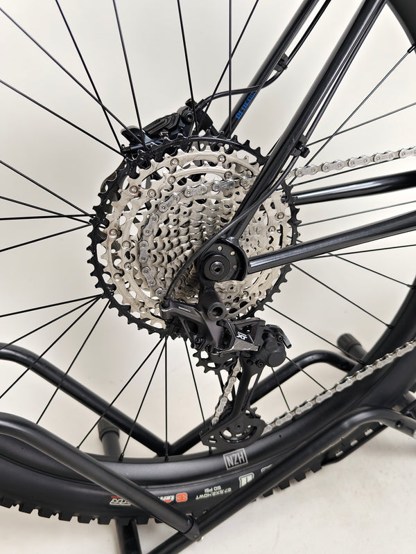 Close-up of the water bottle holder on the Used Ragley Blue Pig Race 2022, functional and accessible, available at eMado Bikes.