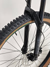 Detail of the bike's tire tread on the Rocky Mountain Instinct Alloy 10 2023, showcasing its traction capabilities, available at eMado Bikes.
