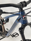 Close-up of the handlebars on the Rocky Mountain Instinct Alloy 10 2023, highlighting the sleek styling and integrated controls, available at eMado Bikes.