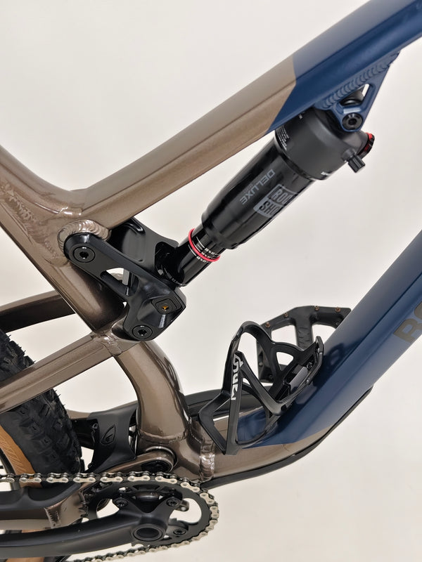 Close-up of the bike frame’s logo on Rocky Mountain Instinct Alloy 10 2023, highlighting its premium branding and aesthetics, available at eMado Bikes.