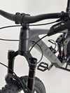 Trek Top Fuel 8 GX AXS 2024 LARGE Frame in Excellent Condition at eMado Bikes in action, depicting real-world performance.