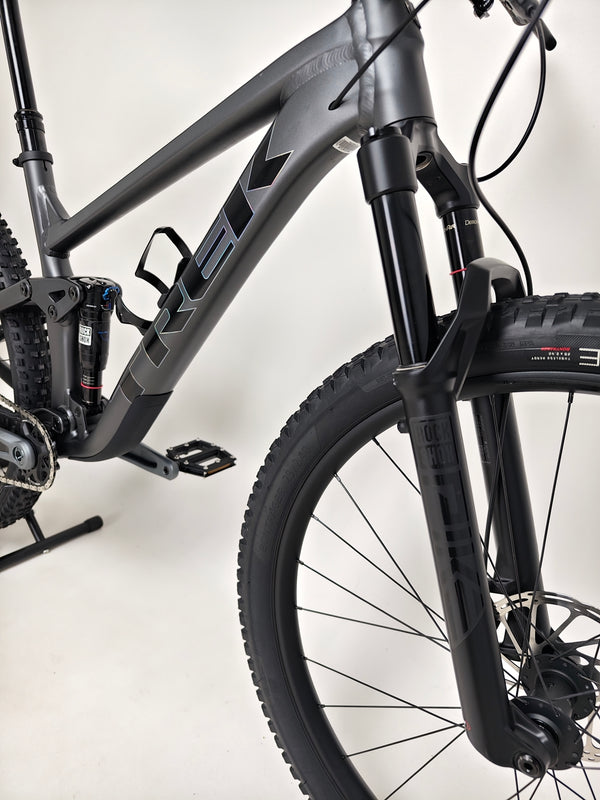 Top-down view of Trek Top Fuel 8 GX AXS 2024 LARGE Frame in Excellent Condition at eMado Bikes, highlighting the bike's clean lines and modern design.