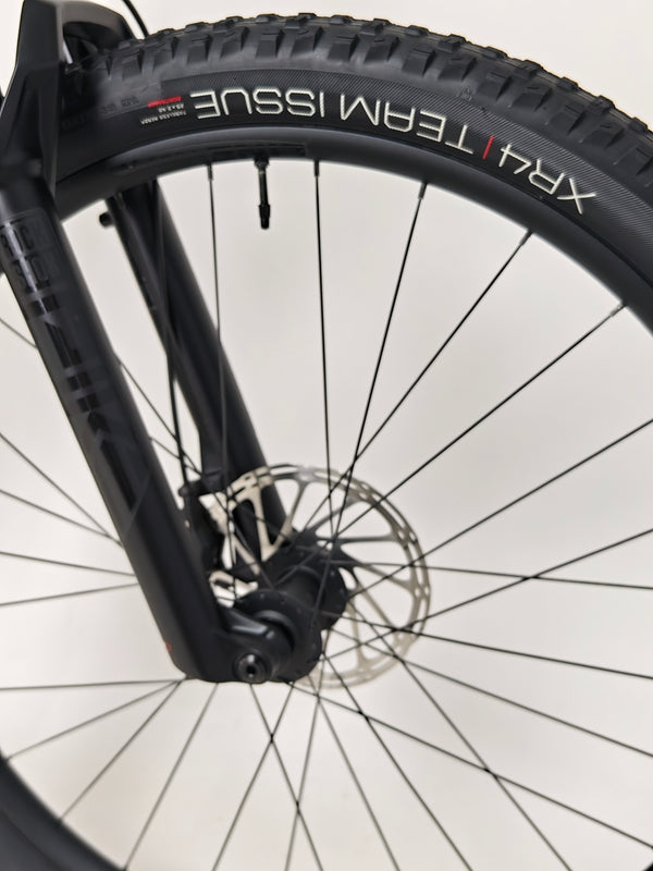 Focused view of the Trek Top Fuel 8 GX AXS 2024 LARGE Frame in Excellent Condition at eMado Bikes while on a biking adventure.