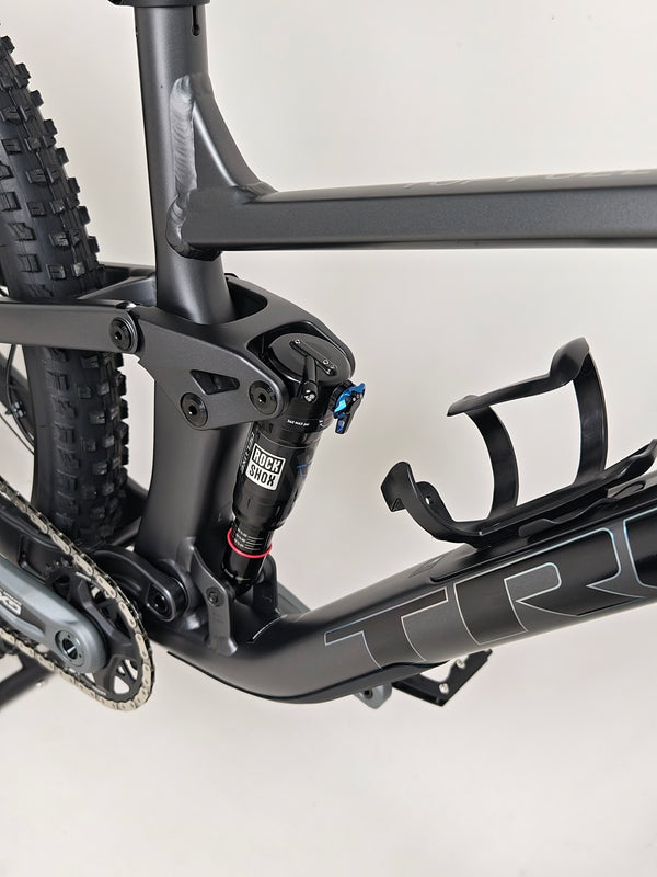 Trek Top Fuel 8 GX AXS 2024 LARGE Frame in Excellent Condition at eMado Bikes showcasing its unique geometry built for performance.