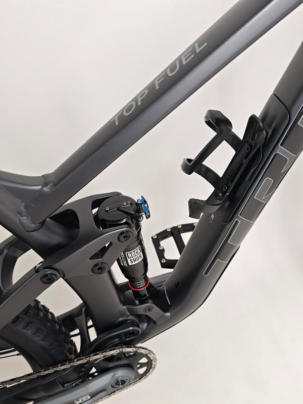 Trek Top Fuel 8 GX AXS 2024 LARGE Frame in Excellent Condition at eMado Bikes celebrated in a community bike event.