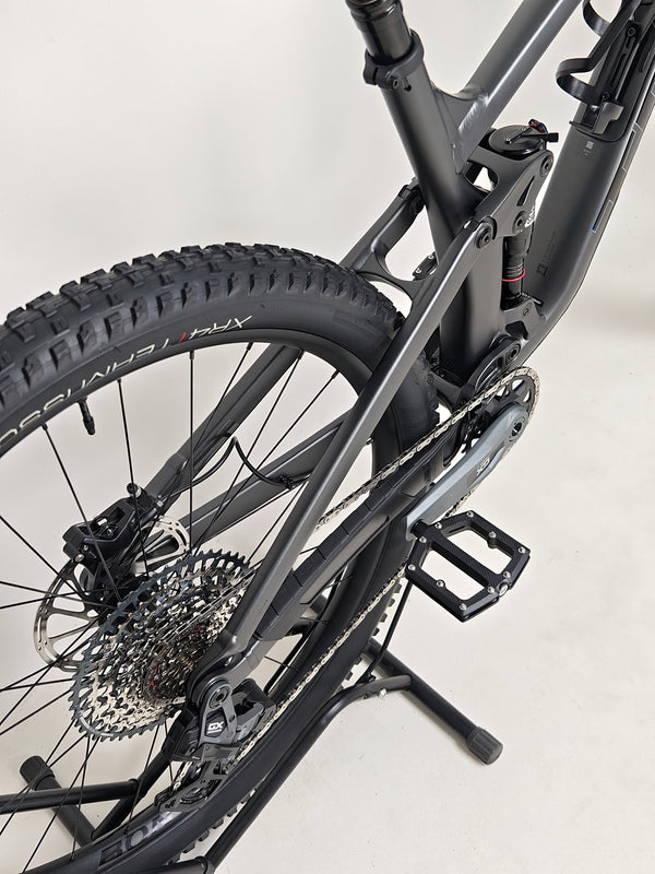 Trek Top Fuel 8 GX AXS 2024 LARGE Frame in Excellent Condition at eMado Bikes highlighted with easy access battery pack for SRAM eTap components.