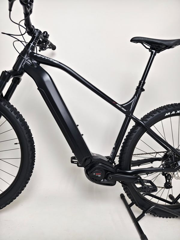 Front fork of the Whyte e-505 v1 Electric Bike 2024, highlighting the advanced RockShox suspension features.