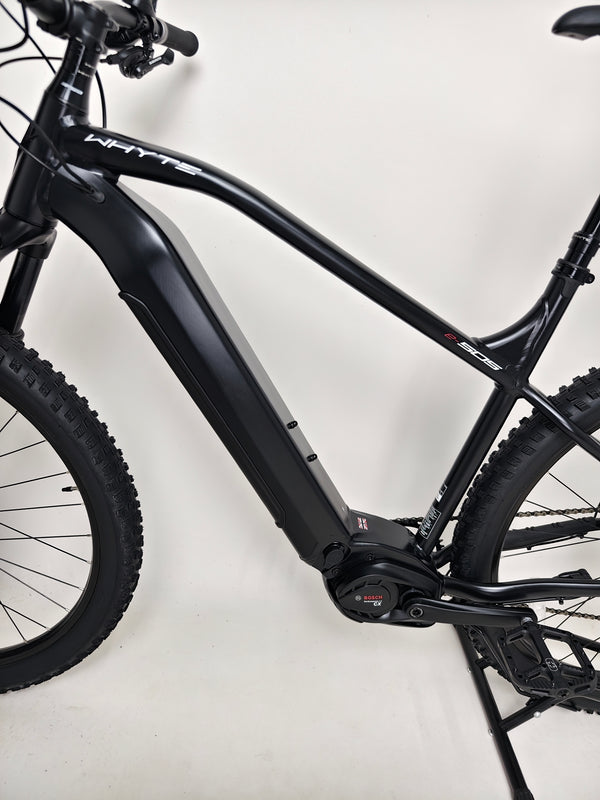 Close layout view of components of the Whyte e-505 v1 Electric Bike 2024, showcasing the SRAM GX shifter.