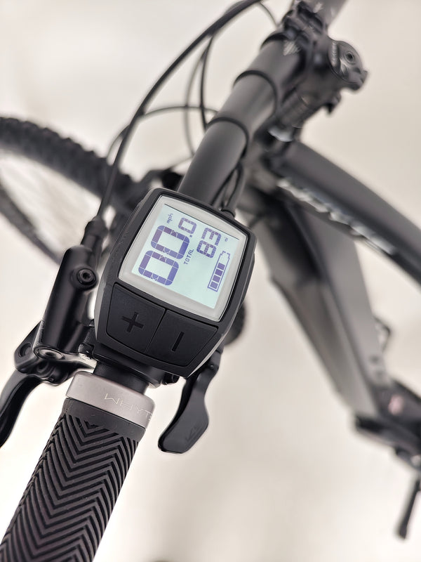 Inside view of the Whyte e-505 v1 Electric Bike 2024, detailing internal cable routing and clean aesthetics.