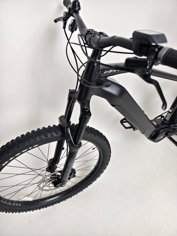 Overview shot of the Whyte e-505 v1 Electric Bike 2024 in XL on display, spotlighting its excellent condition.