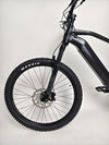 Whyte e-505 v1 Electric Bike 2024 in XL with a contrasting backdrop, accentuating its aesthetic appeal and functionality.