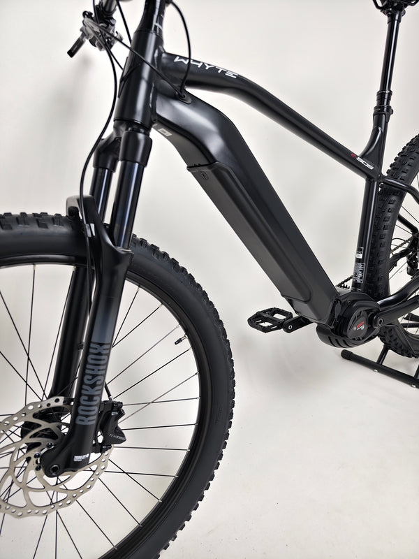 Whyte e-505 v1 Electric Bike 2024 in XL with the Bosch motor and battery, illustrating its high-quality components.