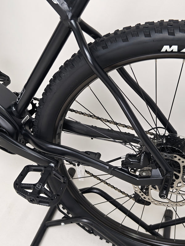 Whyte e-505 v1 Electric Bike 2024 detailed view of its braking system indicating high-performance capability.