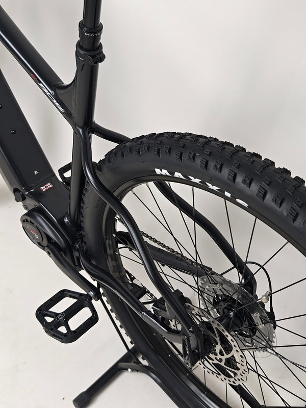 Whyte e-505 v1 Electric Bike 2024 overall view in a well-lit setting, indicating its premium condition.