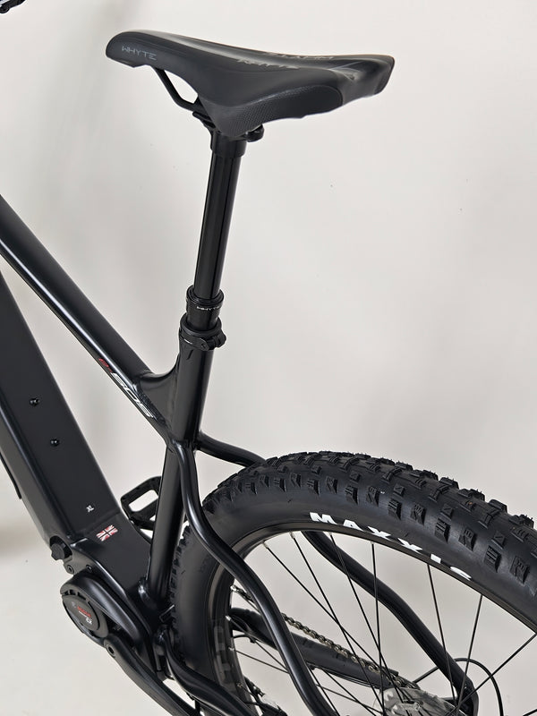 Close focus on the wheel of the Whyte e-505 v1 Electric Bike 2024 showing the tubeless ready feature.