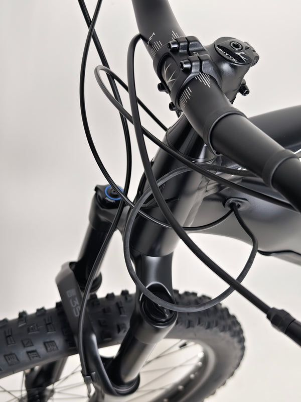 Side detail view of the Whyte e-505 v1 Electric Bike 2024, illustrating its high-end braking system.