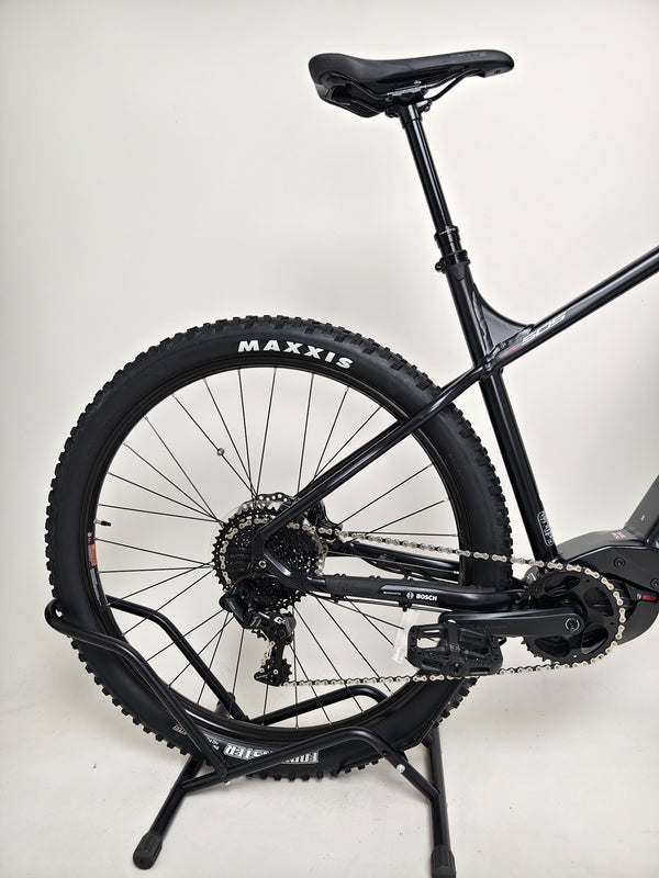 The seat of the Whyte e-505 v1 Electric Bike 2024, emphasizing comfort and ergonomic design for longer rides.