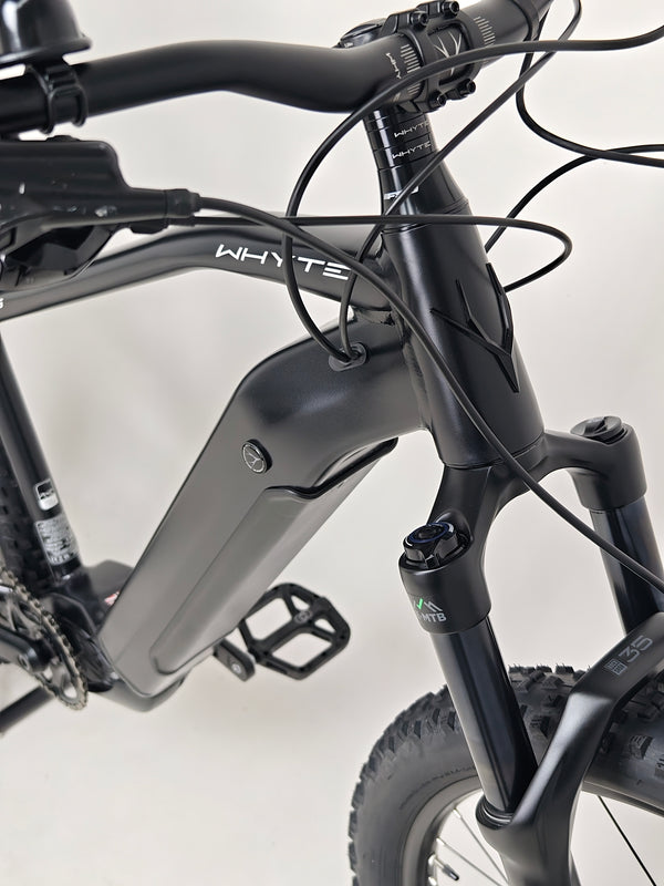 Close-up of the Whyte e-505 v1 Electric Bike 2024 wheels and tyres, showcasing the Maxxis Forekaster design, like new.