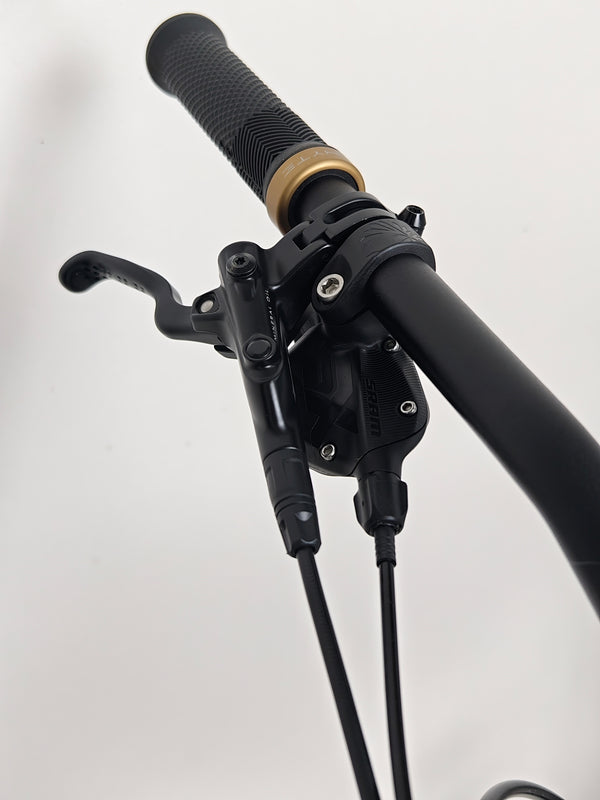 Side view of the tire tread on the rear of the Whyte 901 V5 2024 Mountain Bike at eMado.