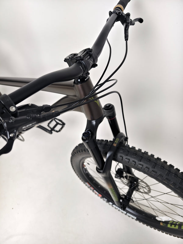 Detailed view of the rear tire and tread on the Whyte 901 V5 2024 Mountain Bike at eMado.