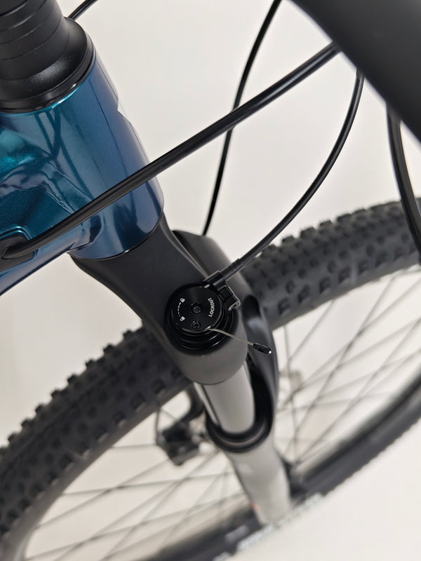 Giant XTC SLR 29 1 2024 in Excellent Condition at eMado Bikes - bike in action during a test ride.